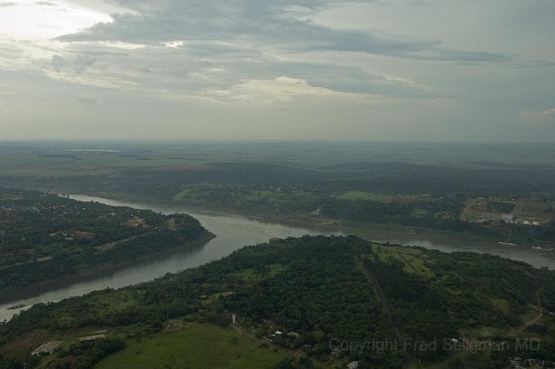 20071204_162638  D2X 4200x2800.jpg - The Parana River is joined by the Iguacu River.   This is the junction between 3 countries - Argentina, Paraguay and Brazil